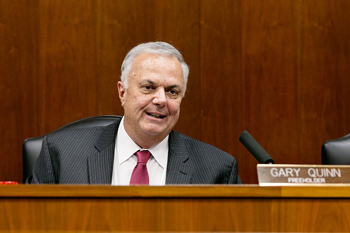 Gary Quinn at the dais. (Photo by Jennifer Peacock)