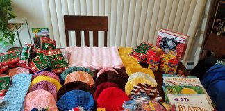 The Women’s Club managed to bring in 125 Christmas loot bags filled with toys, 29 hand-crocheted scarves, hats, and lap blankets for children, which were made by the club’s members, as well as books, bookmarks, backpacks, duffel bags, and a BJ's gift card. (Photo courtesy The Women's Club of Point Pleasant)