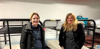 Seeds Of Service Executive Director Christie Winters, left, and Moira Edge, who runs the Bay store are in a room that will temporarily house volunteers who come to help with their mission. (Photo by Judy Smestad-Nunn)