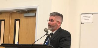 Superintendent Gerard Dalton presents information about the district’s finances. (Photo by Judy Smestad-Nunn)