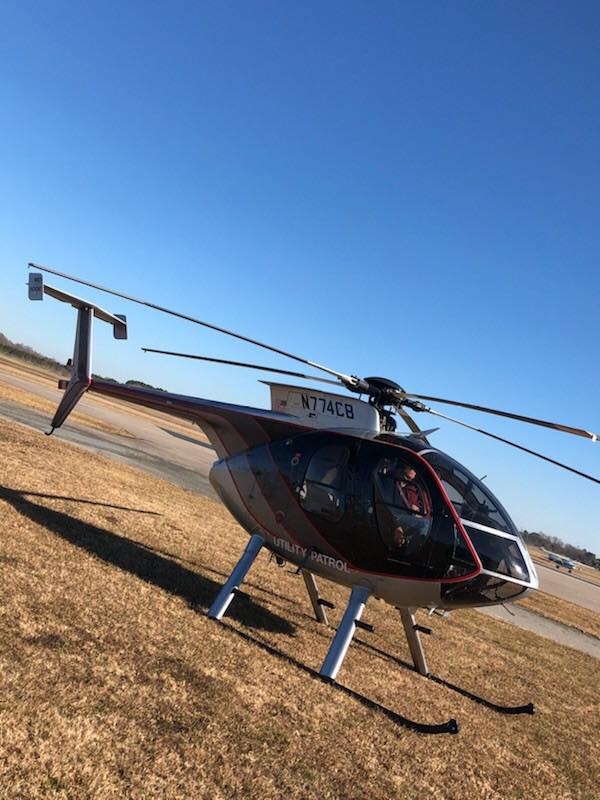 A Black, Hughes MD500, number N774CB. (Photo courtesy JCP&L)