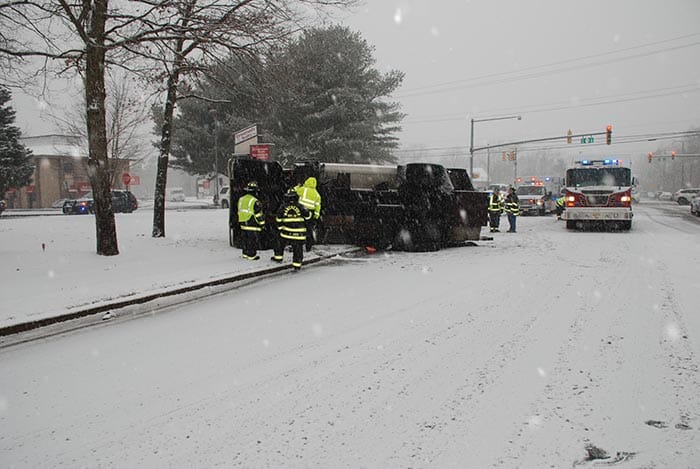 A fuel oil tanker overturned at Routes 70 and 571 Wednesday, sending its driver to the hospital with non-life-threatening injuries. (Photo courtesy Manchester Police)