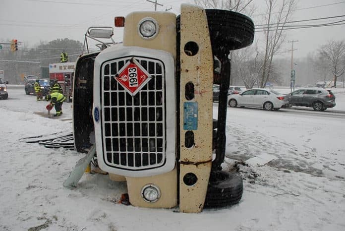 A fuel oil tanker overturned at Routes 70 and 571 Wednesday, sending its driver to the hospital with non-life-threatening injuries. (Photo courtesy Manchester Police)