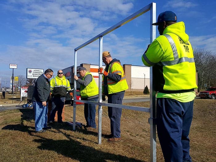 The Alliance's very first prevention banner of an on-going series was unveiled this week at town hall. Paul Novello, DPW director, and his crew Connor Grace, George McCoy, James Burdick, and Ronnell Decker installed the frame on Feb. 5. (Photo courtesy Christa Riddle)