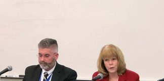 Susan McNamara, Director of Planning, Research and Evaluation, discusses district goals, sitting beside Superintendent Gerard Dalton. (Photo by Judy Smestad-Nunn)
