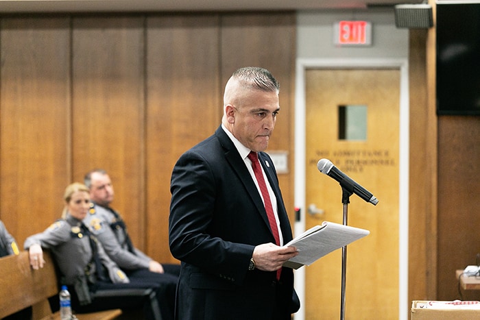 Former Manchester Police Chief and Manchester First Aid Life Member Brian Klimakowski responds to reports that the township is considering going to paid EMS. Behind him sit current Police Chief Lisa Parker and Captain Todd Malland. (Photo by Jennifer Peacock)