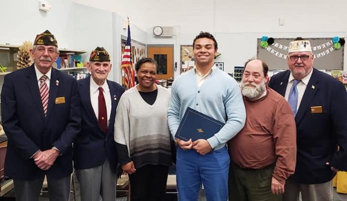 Andrew Dodd with his parents and VFW representatives. (Photo courtesy Manchester Township School District)