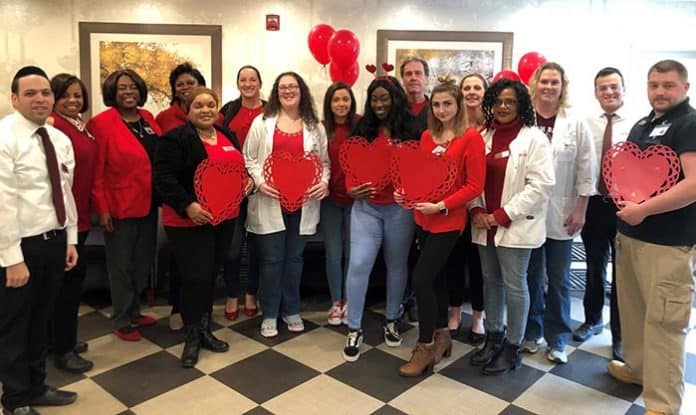 Staff at Willow Springs Rehabilitation & Healthcare Center went “red for women” to celebrate cardiac health awareness recently. (Photo courtesy Willow Springs)