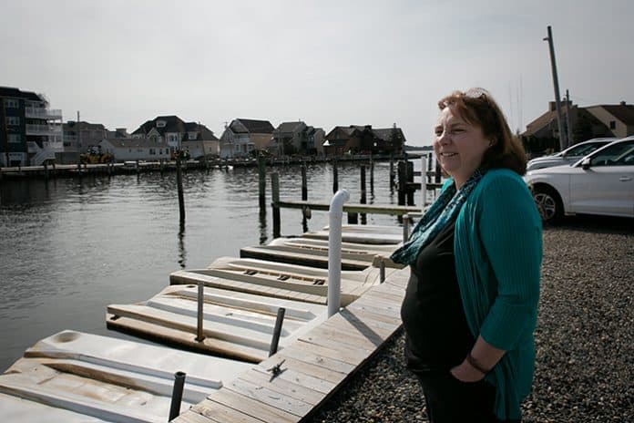 Deborah Mura lives very close to Silver Bay. Though Sandy hit more than 6 years ago, her imprint is still seen and felt in this neighborhood. (Photo by Jennifer Peacock)