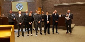 Jackson Police Chief Matthew Kunz addresses the Jackson Council and introduces the newest additions to the Jackson Police Department who were sworn in by Township Clerk Janice Kisty during a recent council meeting. (Photo by Bob Vosseller)