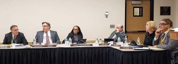 Superintendent Stephen Genco, left, joins Board President John Burnetsky, and board members Sharon Dey, Michael Walsh, Tara Rivera and Gus Acevedo in a discussion about the district’s tentative spending plan. (Photo by Bob Vosseller)