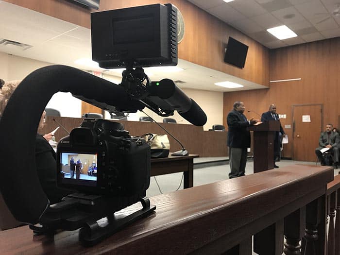 Superior Court Judge James W. Palmer Jr., left, speaks about how much work has already been done for the poor. (Photo by Chris Lundy)