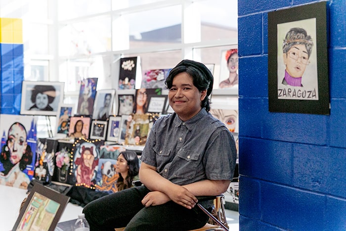 Senior Ben Zaragoza with a self-portrait. (Photo by Jennifer Peacock)