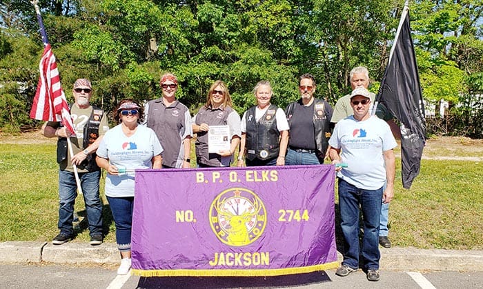 Members of the Jackson Elks Lodge gather before the parade staging area. (Photo by Bob Vosseller)