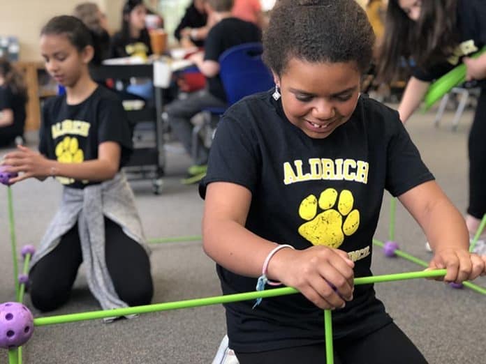Students and staff explore hands-on alternatives to lectures in the new model classroom space at Aldrich Elementary. (Photo courtesy Andrew Smith)