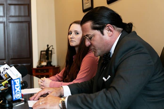 Ashley Stanfield and her attorney Robert Fuggi faced room of reporters Friday afternoon. (Photo by Jennifer Peacock)