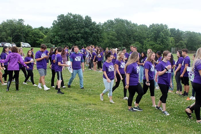 On June 13, several hundred students decked out in purple gear took to the school grounds to form a human outline of New Jersey State, with the help of the statewide nonprofit, Alzheimer’s New Jersey. (Photo courtesy Alzheimer’s New Jersey)