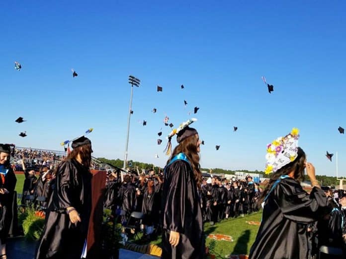 The Class of 2019 tosses their caps into the air, celebrating the end of their high school careers. (Photo courtesy Southern Regional School District)