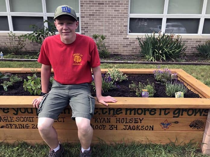 Ryan Holsey, 16, of Jackson made it his mission to build a raised sensory garden for individuals with intellectual and developmental disabilities (I/DD) at The Arc of Monmouth’s Tinton Falls headquarters. (Photo courtesy Arc of Monmouth)