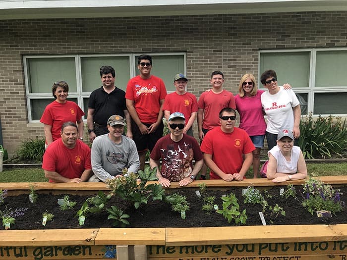 Ryan Holsey with Troop 34, Jackson, and members of The Arc's Recreation club. (Photo courtesy Arc of Monmouth)