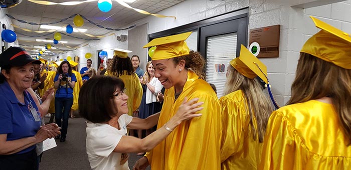 All three elementary schools were visited by their graduating seniors. Here, seniors walk the halls of Whiting Elementary School. (Photo courtesy Manchester Township High School)