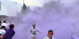 Colored corn starch paints the runners purple. (Photo by Judy Smestad-Nunn)