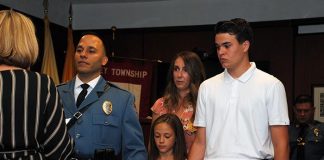 Officer Dimitrios Tsarnas was promoted to the rank of Sergeant. He was joined by his wife, Allison, and two children. (Photo courtesy Lacey Township Police)