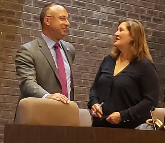 Jackson Council President Rob Nixon talks to Township Attorney Jean Cipriani moments before the start of a June 25 council meeting where the governing body voted to retain her service for the rest of the year. (Photo by Bob Vosseller)