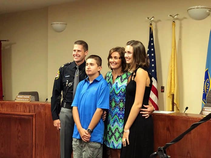 On July 16, Captain Vaughn was sworn in by Mayor Gregory Myhre at the township council meeting. (Photo by Kimberly Bosco)