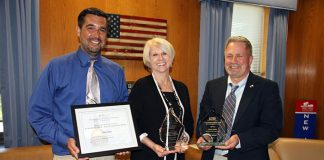 Displaying some of the awards garnered by the design and redevelopment of the John C. Bartlett Jr. County Park at Berkeley Island are from left to right, Joseph A. Pirozek, Ocean County Department of Parks and Recreation, Ocean County Freeholder Director Virginia E. Haines, Chairwoman of the Ocean County Department of Parks and Recreation and Michael T. Mangum, Director of the Ocean County Department of Parks and Recreation. (Photo courtesy Ocean County)