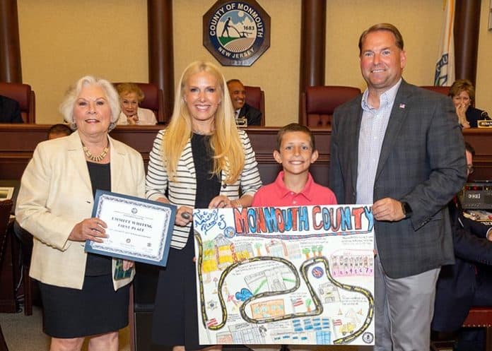 First place winner Emmitt Whiting of Brielle Elementary School with, from left to right, Surrogate Rosemarie D. Peters, Clerk Christine Giordano Hanlon and Sheriff Shaun Golden. (Photo courtesy Monmouth County)