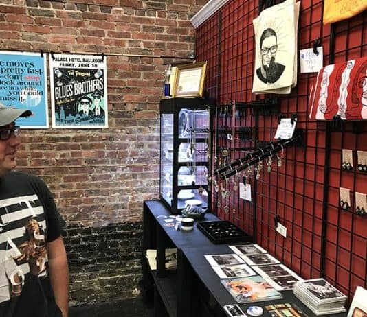 Jimmy Mura shows off punk and pop culture-themed items in the shop at 53 Main Street (Route 9 in downtown Toms River). (Photo by Chris Lundy)