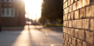 Brick wall and street. (File photo)