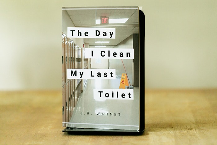 “The Day I Clean My Last Toilet,” a novel by J.R. Warnet. (Photo by Jennifer Peacock)