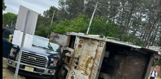 Garbage Truck Overturns On Route 70, Injuries