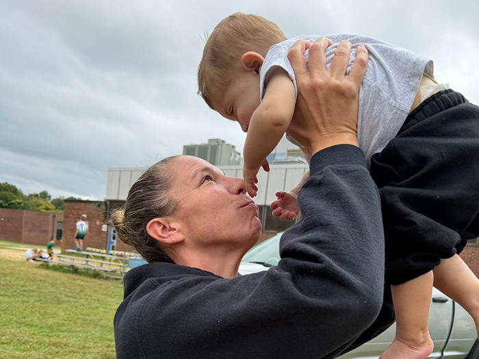 Courtney Olsen holds CJ Fischetti, the toddler whose life she saved through a liver donation.